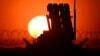 This photograph taken during sunset on March 6, 2025 shows a Patriot air defence system installed at the military hub for Ukraine at the Rzeszow-Jasionka airport in Jasionka, south-east Poland.